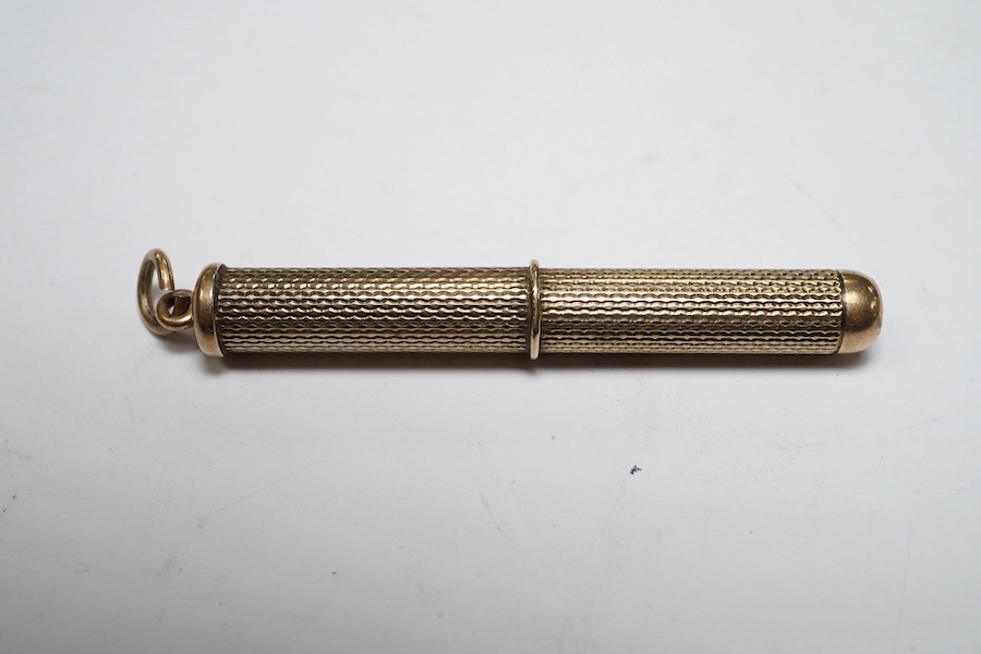 A 1960's 9ct gold cased propelling toothpick, by Asprey & Co Ltd, 48mm. Condition - fair to good